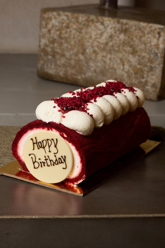 Red Velvet Roulade with Happy Birthday White Chocolate Plaque